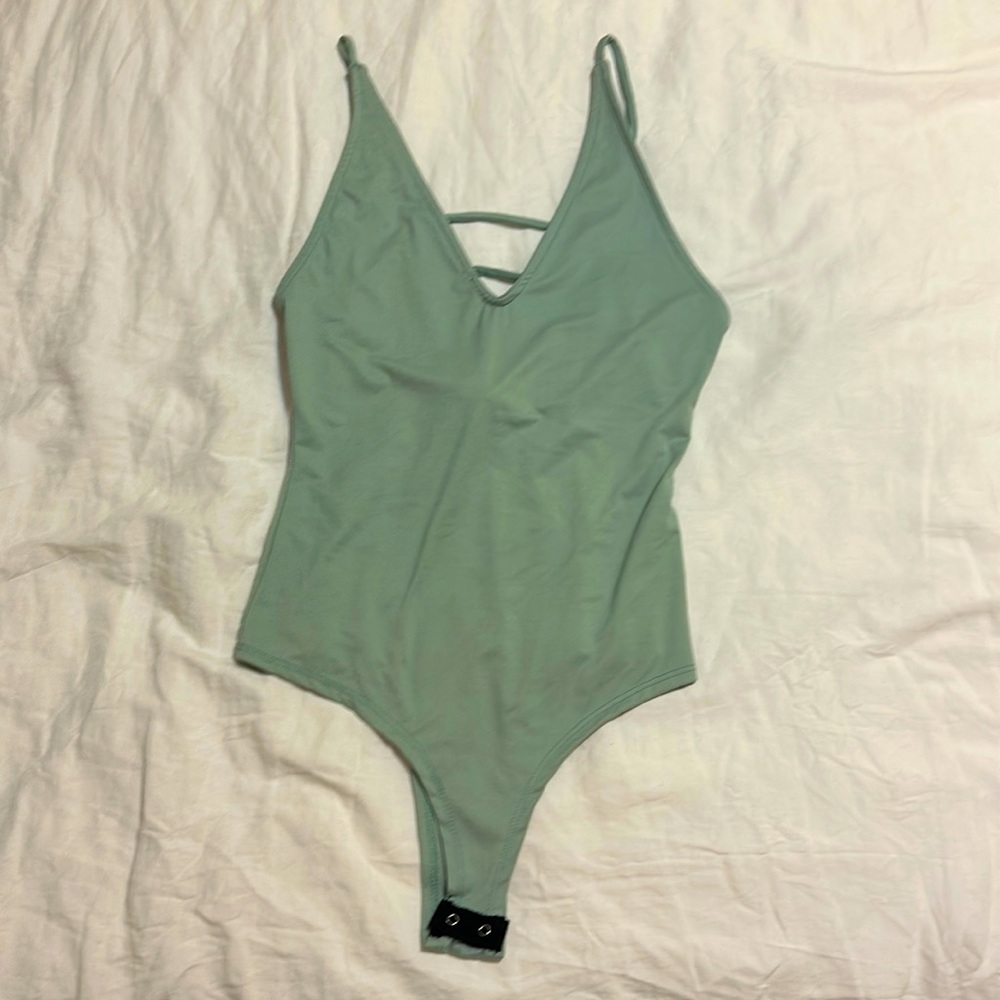 Green body suit